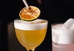Garnishing cocktail at The Botanist Sloane Square