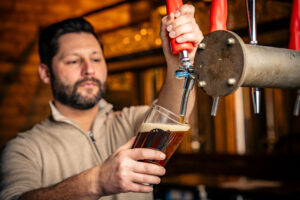 Pouring a craft beer